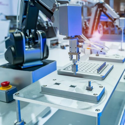 Automated,Process,Industrial,Robot,Loading,Metal,Part.,Industrial,Manufacturing
